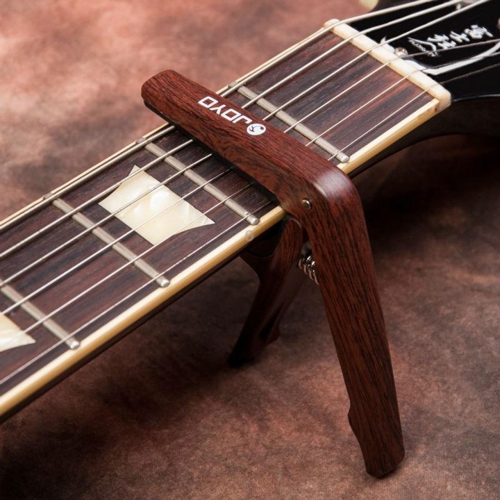 JOYO JCP-01 Guitar Capo Plastic Steel Lightweight Ukulele Capo (Brown)