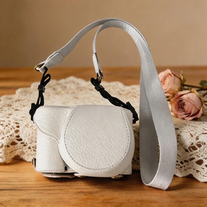 For Sony ZV-E10 Vintage PU Leather Camera Case Bag Retro Lychee Pattern Protective Cover with Shoulder Strap(White)